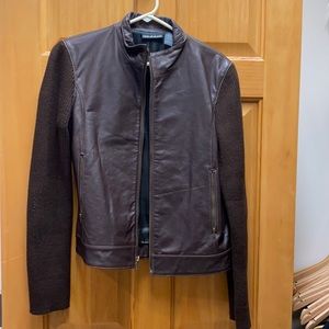 Brown leather jacket with sweater sleeves